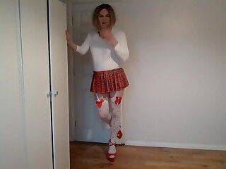 Taking off my miniskirt in cute stockings - ashemaletube.com
