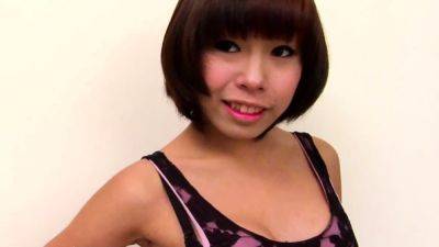 Short-haired ladyboy in pink dress strokes her small cock - drtuber.com